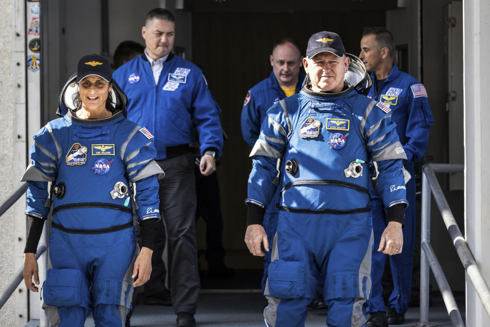 NASA's Boeing Crew Flight Test astronauts Suni Williams and Butch Wilmore exit the Neil A. Armstrong Operations and Checkout Building at the agency's Kennedy Space Center in Florida during a mission dress rehearsal on Friday, April 26, 2024. The first flight of Boeing’s Starliner capsule with a crew on board is scheduled for Monday, May 6, 2024. (Frank Micheaux/NASA via AP)