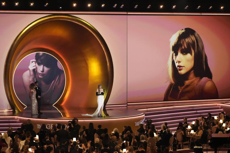 Taylor Swift accepts the award for best pop vocal album for "Midnights" during the 66th annual Grammy Awards on Sunday, Feb. 4, 2024, in Los Angeles. (AP Photo/Chris Pizzello)