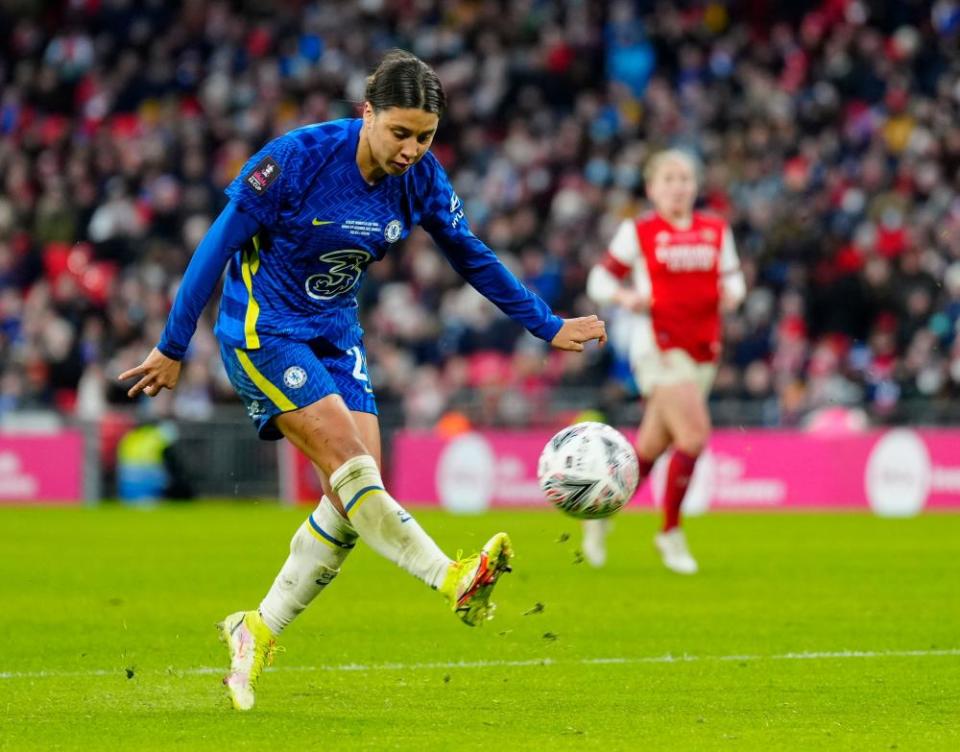 Sam Kerr dinks a delightful third Chelsea goal over the Arsenal goalkeeper Manuela Zinsberger.