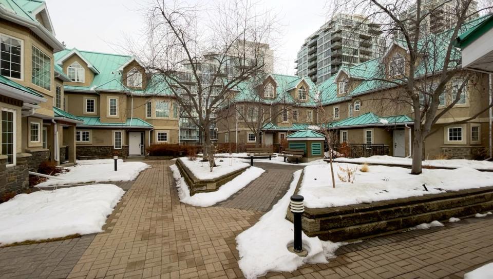 The inside courtyard in the River Run townhouse complex. The city is now listed on the land titles for all 23 units. 