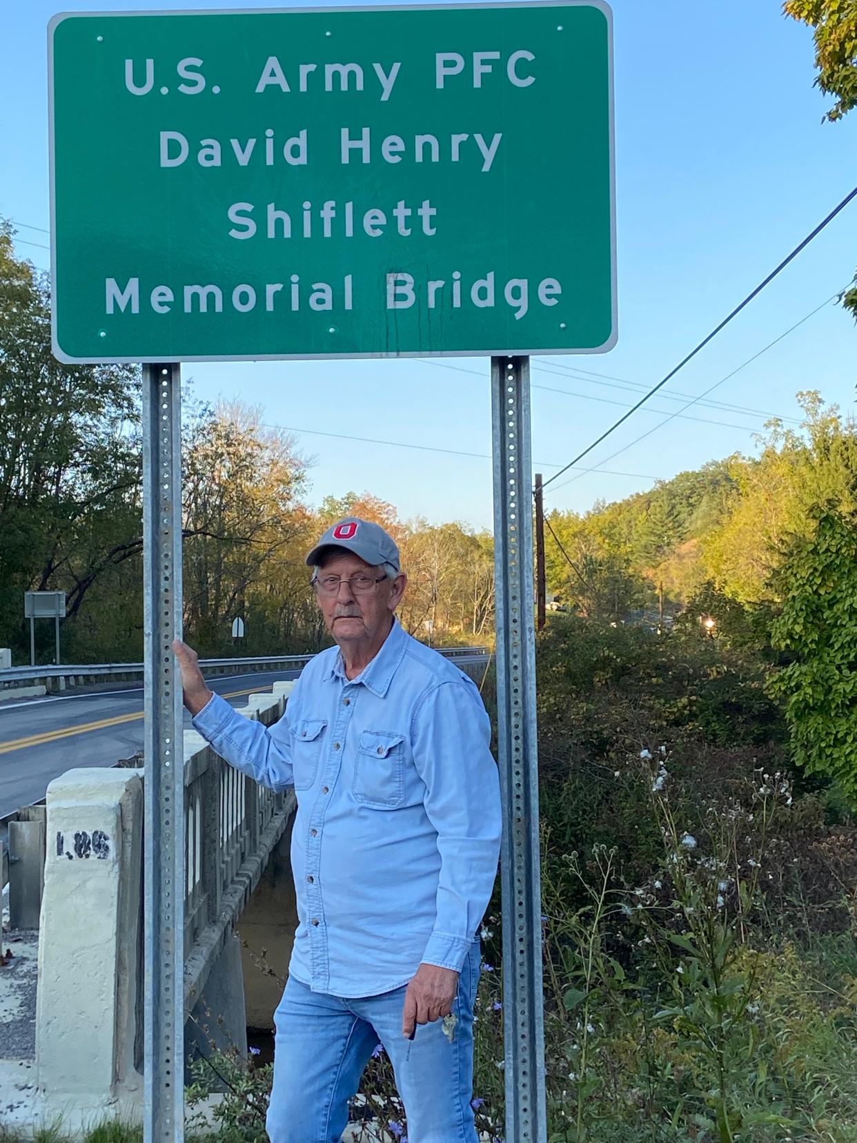 Dean Pace at the West Virginia bridge named in honor of his friend and fellow soldier.