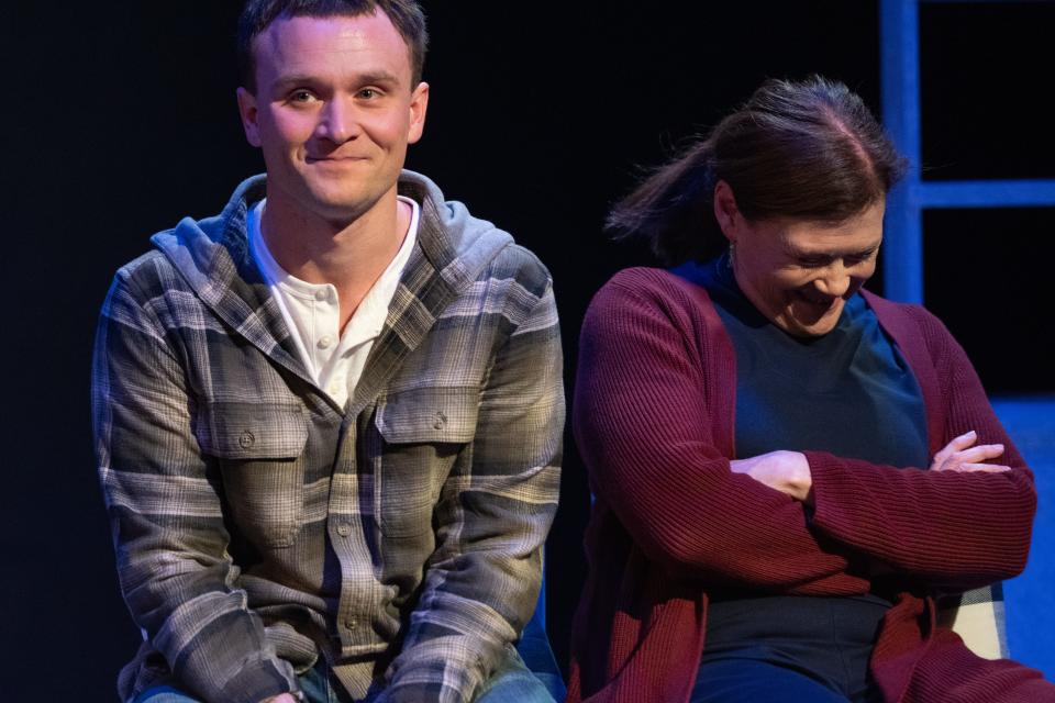 Evan Stevens, left, and Vickie Daignault share a light-hearted moment in Adam Rapp’s “The Sound Inside” at Urbanite Theatre.