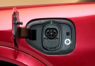 FILE PHOTO: The charging socket is seen on Ford Motor Co's all-new electric Mustang Mach-E vehicle during a photo shoot at a studio in Warren, Michigan