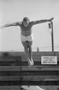 <p>Steve McQueen dives off of his diving board at his Palm Springs, California, home in 1963.</p>