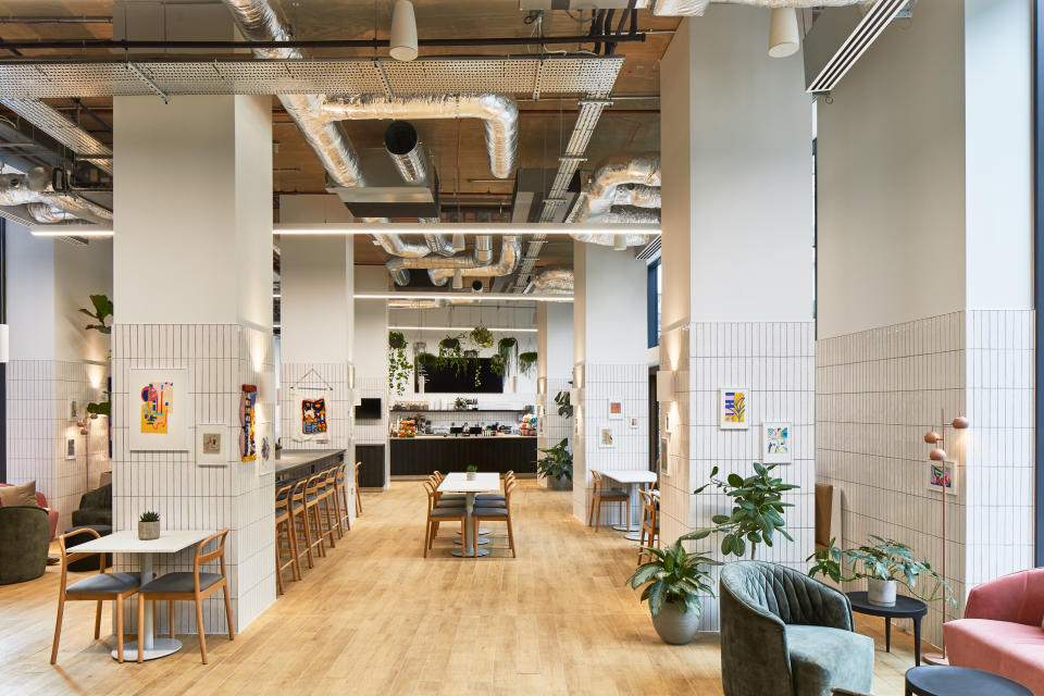 The Collective Canary Wharf lobby cafe is featured in this photo.