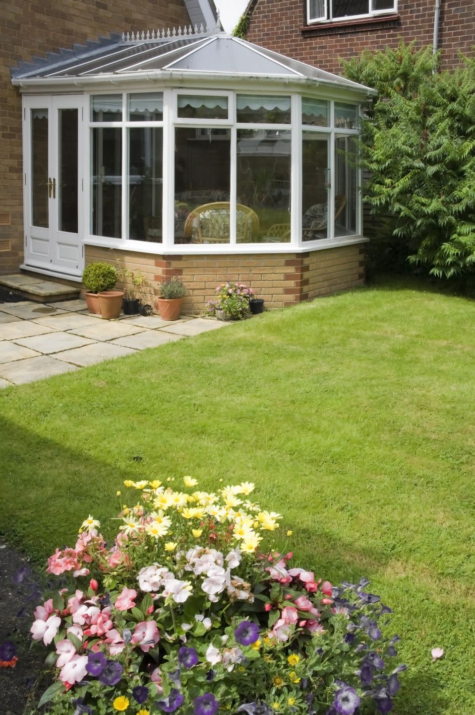 <p>You do not need planning permission for a conservatory, provided you adhere to limits and conditions, including extensions should not be higher than the highest part of the roof, no verandas, balconies or raised platforms and no more than half the of land around the house would be covered by additions.</p><p>Find the full list of conditions on <a href="https://www.comparethemarket.com/home-insurance/content/renovation-nation/#/?option=doineedplanningpermissionforaconservatory" rel="nofollow noopener" target="_blank" data-ylk="slk:Compare The Market's website;elm:context_link;itc:0;sec:content-canvas" class="link ">Compare The Market's website</a>.</p>