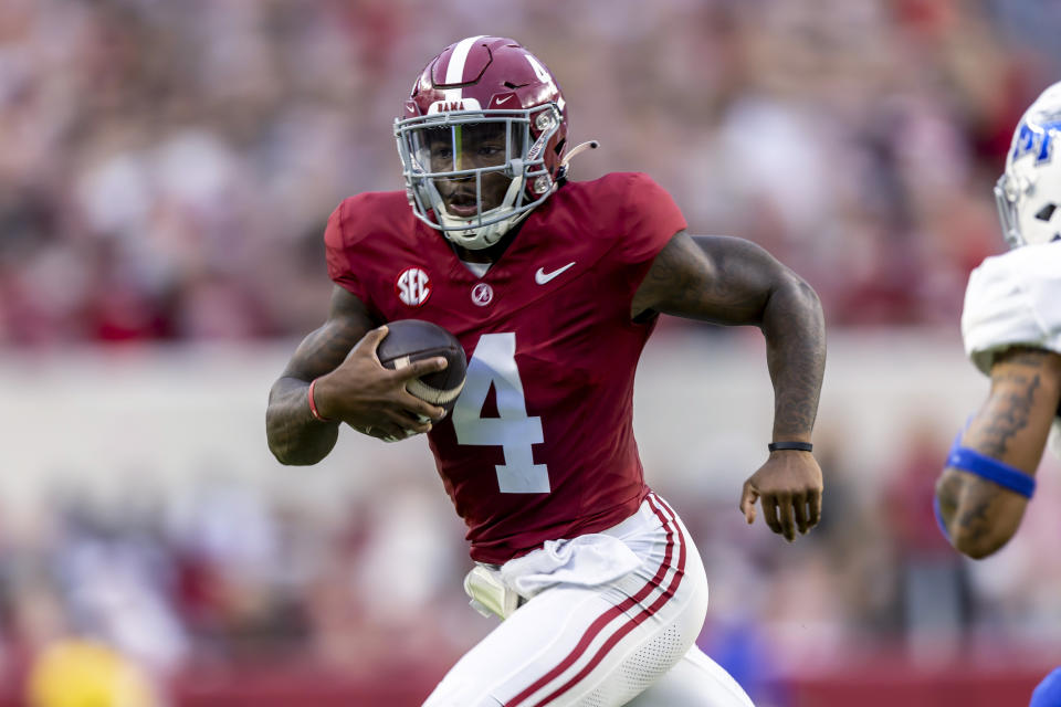 Alabama quarterback Jalen Milroe runs the ball for a touchdown against Middle Tennessee during the first half an NCAA college football game Saturday, Sept. 2, 2023, in Tuscaloosa, Ala. (AP Photo/Vasha Hunt)