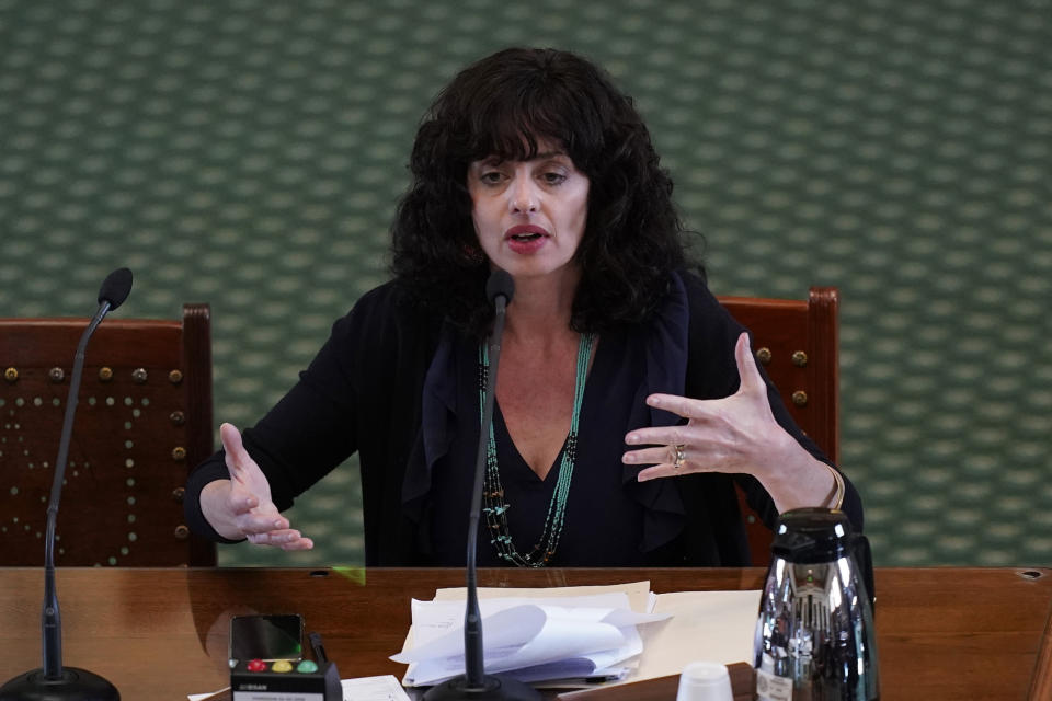 Nicole Golden, Executive Director of Texas Gun Sense, testifies on the second day of a hearing in the state senate chamber, Wednesday, June 22, 2022, in Austin, Texas. The hearing is in response to the recent school shooting at Robb Elementary School in Uvalde, Texas, where two teachers and 19 students were killed. (AP Photo/Eric Gay)