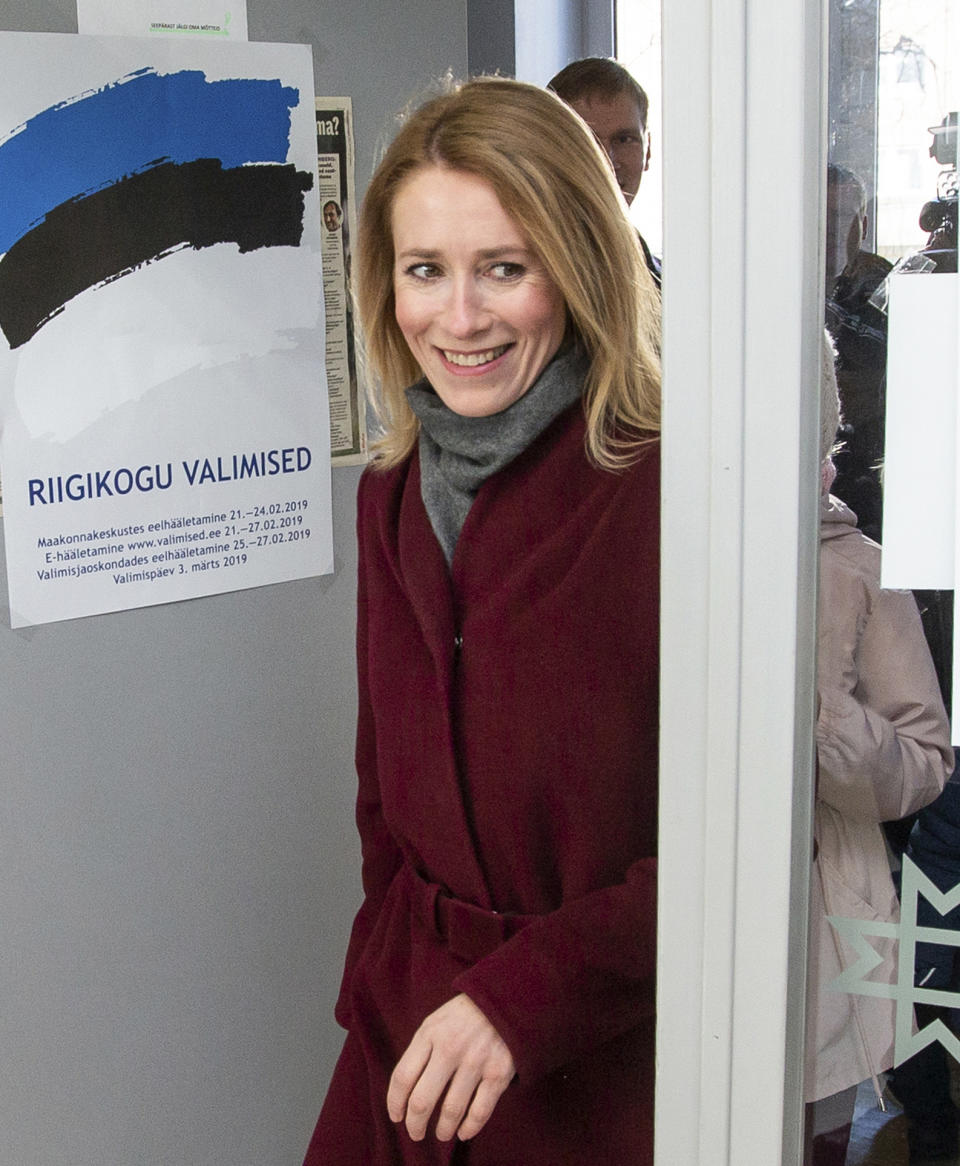 FILE - In this file photo dated Sunday, March 3, 2019, Chairwoman of the Reform Party Kaja Kallas arrives at a polling station during a parliamentary elections in Tallinn, Estonia. 43-year old Kallas has tested positive for COVID-19 and said late Monday March 15, 2021, she was feeling well apart from a small fever and hasn’t developed any other symptoms, she will self-quarantine until recovered. (AP Photo/Raul Mee, FILE)