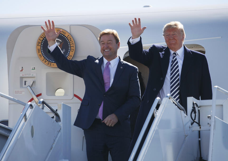 Sen. Dean Heller (R-Nev.) steps off Air Force One with President Donald Trump ahead of a rally in Elko, Nevada, on Saturday. (Photo: ASSOCIATED PRESS)