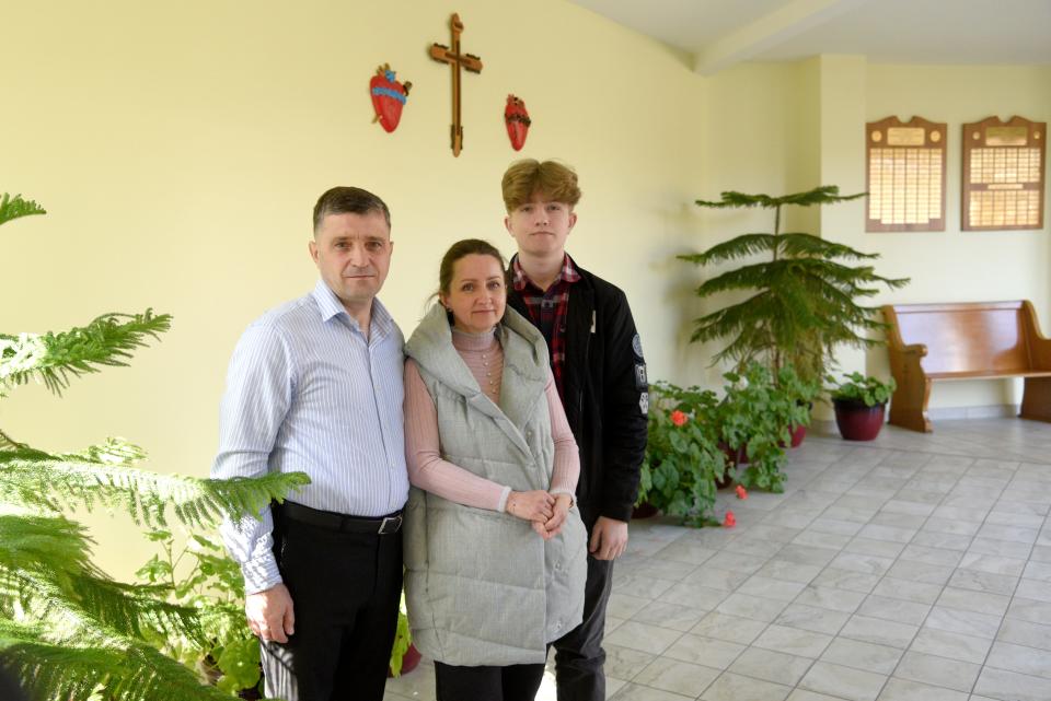 Mykhailo Ivanus, left, with his family on Sunday, February 25, 2024 at St. Stephen Ukrainian Catholic Church in Toms River, New Jersey.