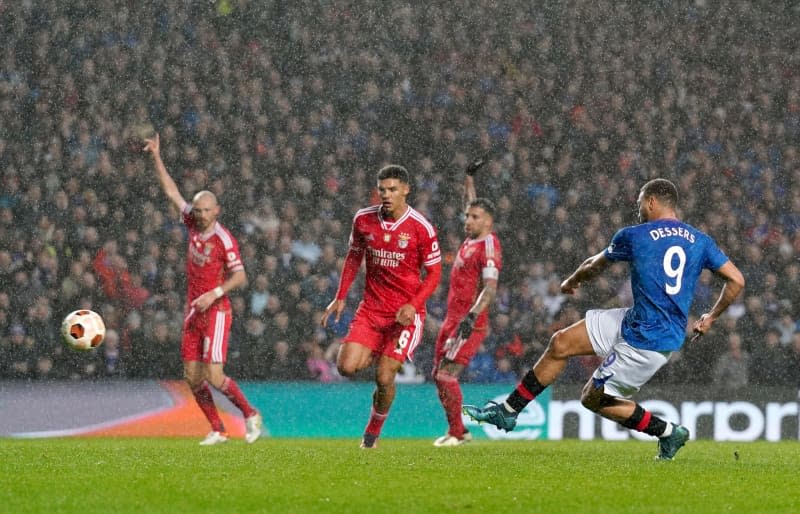 Rangers' Cyriel Dessers has an attempt on goal during the UEFA Europa League Round of 16, second leg soccer match between Rangers and Benfica at the Ibrox Stadium. Andrew Milligan/PA Wire/dpa