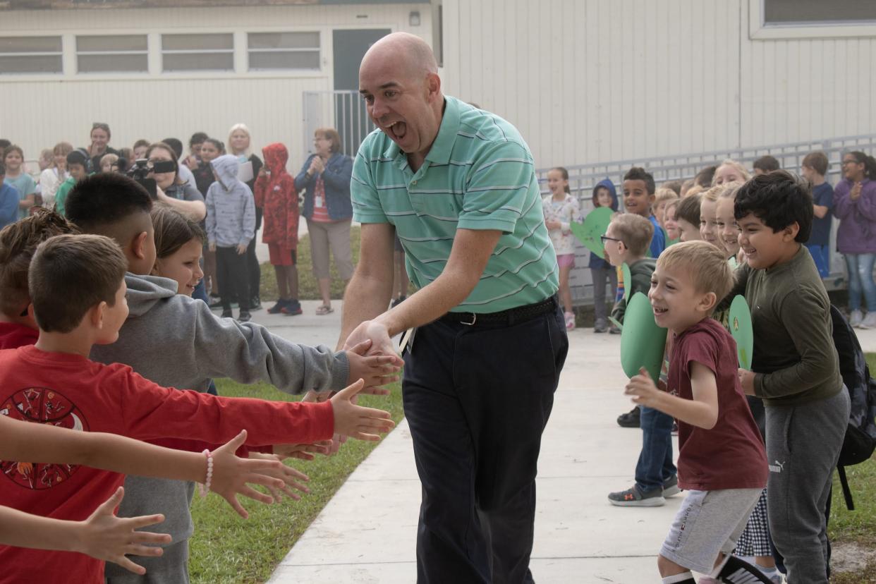 Timothy Ferguson, Sarasota County's 2023 Elementary School Teacher of the Year, with some of his students at Garden Elementary. Now more than ever, we should appreciate teachers and their commitment to educating children, says Jennifer Vigne, CEO of the Education Foundation of Sarasota County.