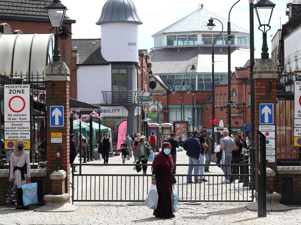 People out shopping in Oldham, Greater Manchester, 30 July 2020: Martin Rickett/PA