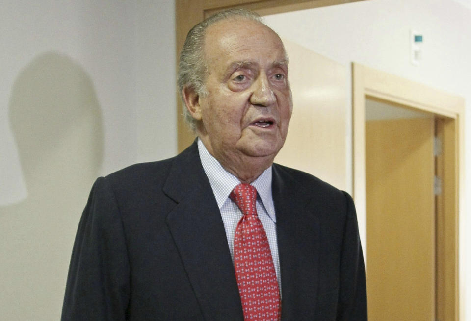 Spain's King Juan Carlos prepares to leave a hospital in Madrid Wednesday April 18, 2012. Spain's King Juan Carlos says he is sorry for having gone on African elephant-hunting trip. In an unprecedented gesture, the 74-year-old monarch said he was "very sorry. I made a mistake. It won't happen again." The king came under scathing criticism this week after he went on a safari trip to Botswana as Spain writhes in its one of its worst ever economic crises. The trip came to light when the king ended up having to be taken to hospital for hip treatment after having fallen. (AP Photo/Paco Campos,Pool)