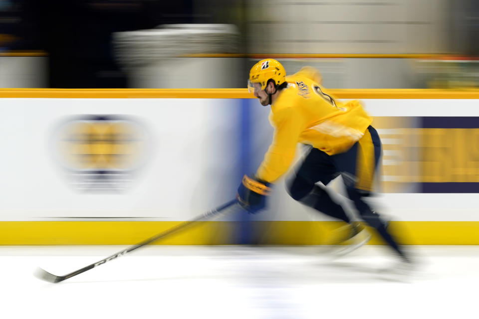 Nashville Predators left wing Filip Forsberg skates down the ice during NHL hockey training camp Monday, Jan. 4, 2021, in Nashville, Tenn. (AP Photo/Mark Humphrey)