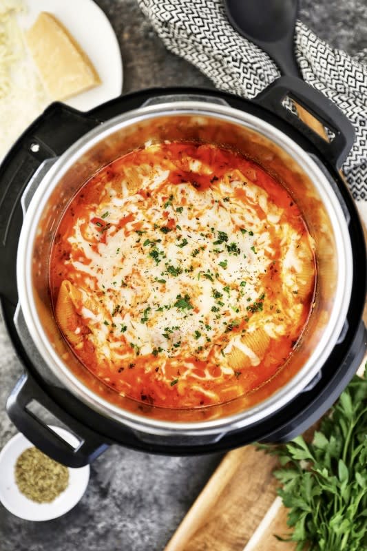 <p>No. 2 Pencil</p><p>Creamy ricotta and mozzarella stuffed shells recipe made easily in an Instant Pot.</p><p><strong>Get the recipe: <a href="https://www.number-2-pencil.com/instant-pot-stuffed-shells-recipe/" rel="nofollow noopener" target="_blank" data-ylk="slk:Instant pot Stuffed Shells;elm:context_link;itc:0;sec:content-canvas" class="link rapid-noclick-resp">Instant pot Stuffed Shells</a></strong></p>