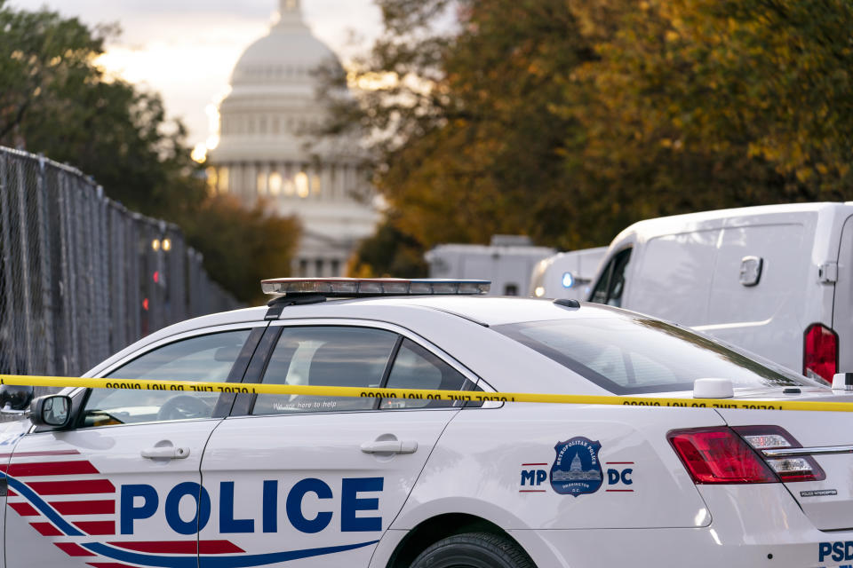 FILE - Washington Metropolitan Police, seen Oct. 19, 2022, in Washington. An off-duty police officer in Washington D.C. was injured Monday, May 20, 2024, when a suspect opened fire as the officer was driving in to work. The injured officer was not in uniform and was driving his personal vehicle. Police later arrested two men after a vehicle pursuit that ended when their car crashed in neighboring Maryland. (AP Photo/J. Scott Applewhite, File)