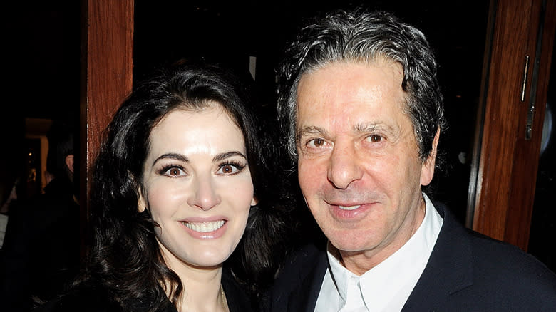 nigella lawson and charles saatchi posing for photo