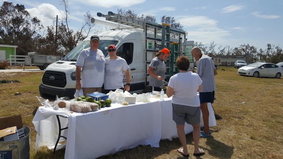 Volunteers help serve food in Goodland, Florida. (Photo: David Lohr/HuffPost)