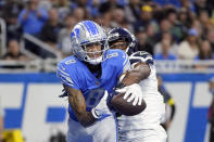 Detroit Lions wide receiver Josh Reynolds (8), defended by Seattle Seahawks cornerback Mike Jackson (30), catches a 3-yard pass for a touchdown during the second half of an NFL football game, Sunday, Oct. 2, 2022, in Detroit. (AP Photo/Paul Sancya)