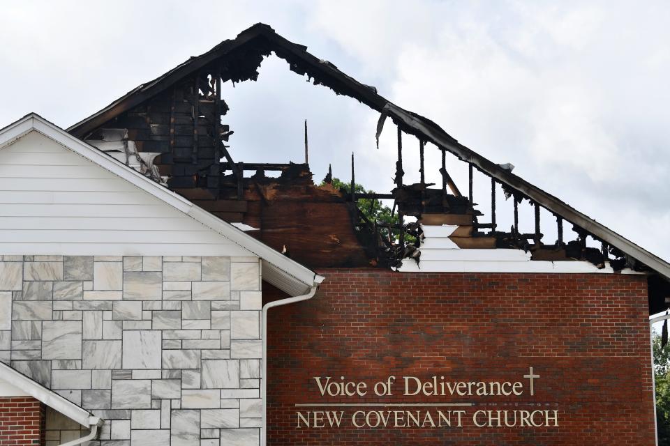 Damage is visible after a fire ripped through the Voice of Deliverance New Covenant Church in Vineland on Monday night, as crews work at the fire scene on Tuesday, August 8, 2023.  