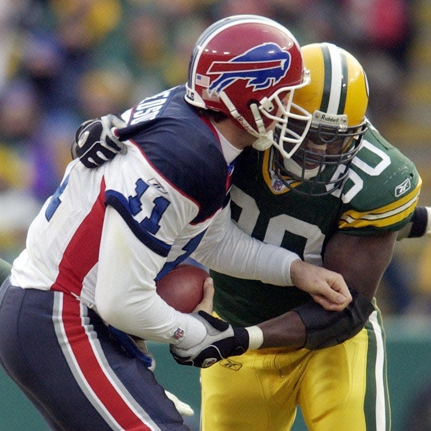 Green Bay Packers defensive end Vonnie Holliday sacks Buffalo Bills quarterback Drew Bledsoe during the fourth quarter of their game Sunday, December 22, 2002 at Lambeau Field in Green Bay, Wis.