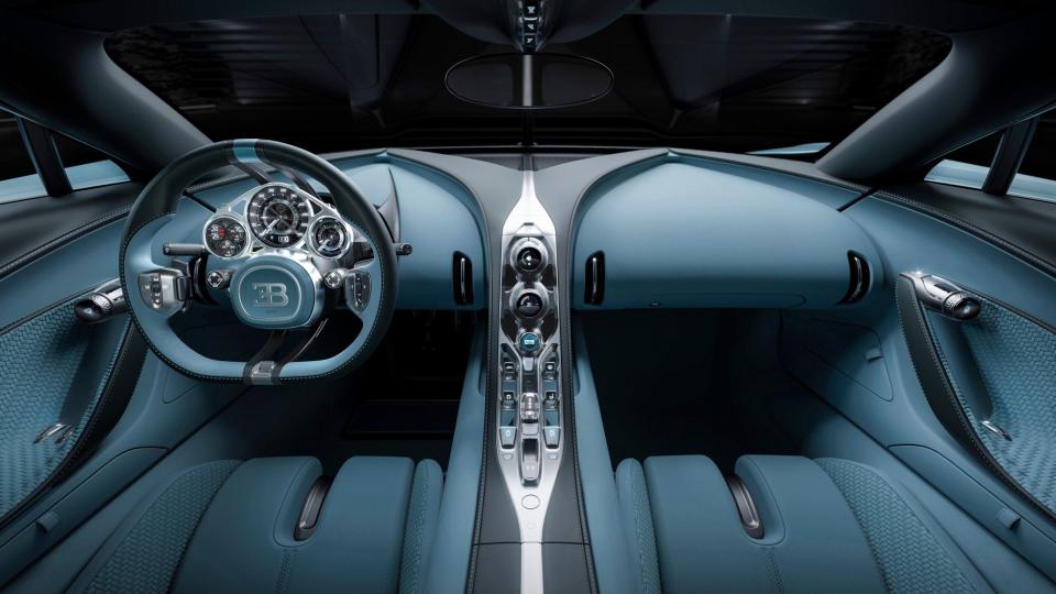 The blue leather cabin of a Bugatti Tourbillon hypercar.