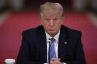 President Donald Trump listens during a "National Dialogue on Safely Reopening America's Schools," event in the East Room of the White House, Tuesday, July 7, 2020, in Washington. (AP Photo/Alex Brandon)