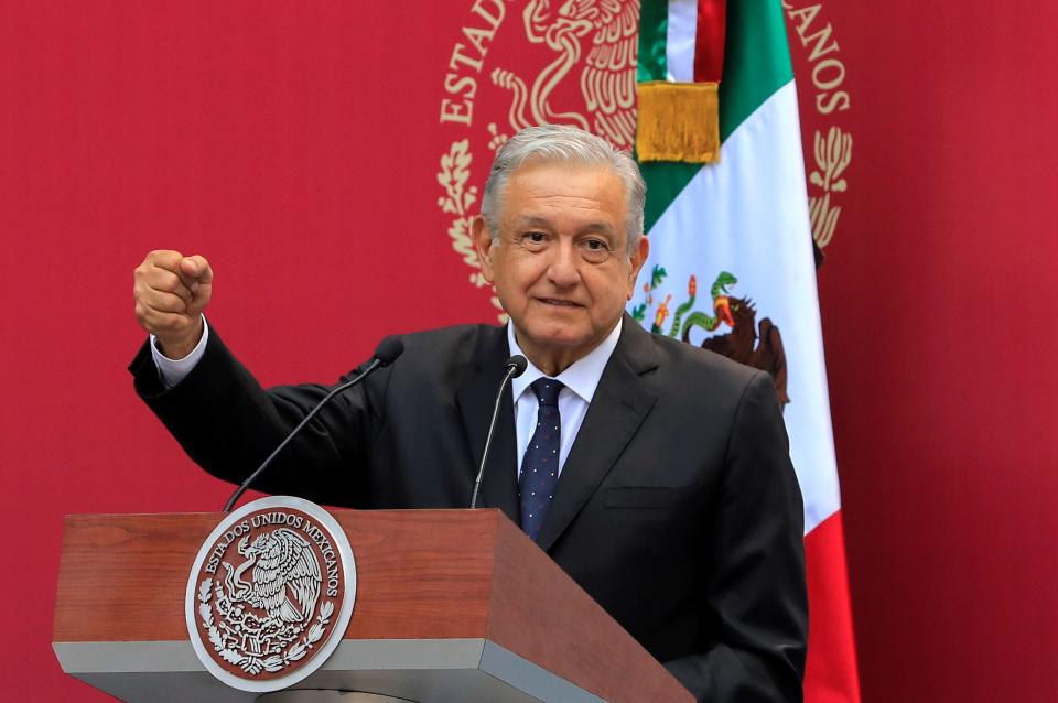 FILE PHOTO: Mexico's President Andres Manuel Lopez Obrador greets the Mexican delegation competing at the 2019 Pan American Games Lima, in Mexico City, Mexico, July 15, 2019. REUTERS/Carlos Jasso/File Photo