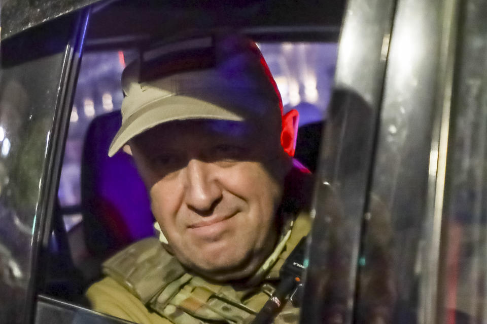 FILE - Yevgeny Prigozhin, the owner of the Wagner Group military company, looks from a military vehicle leaving an area of the HQ of the Southern Military District in a street in Rostov-on-Don, Russia, on June 24, 2023. The final two months of Yevgeny Prigozhin's life are shrouded in mystery. When the Russian mercenary leader staged a mutiny against the country's military in June, President Vladimir Putin decried it as 