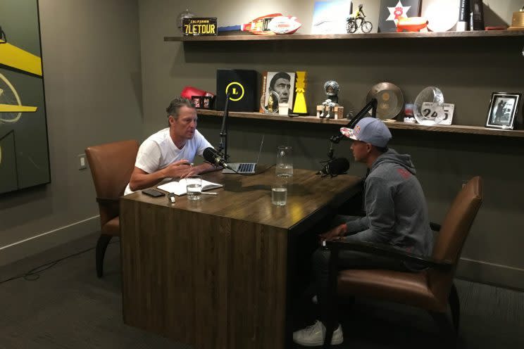 Armstrong talks with golfer Rickie Fowler in the former pro cyclist's studio in Austin in April. (Photo courtesy Mark Higgins)