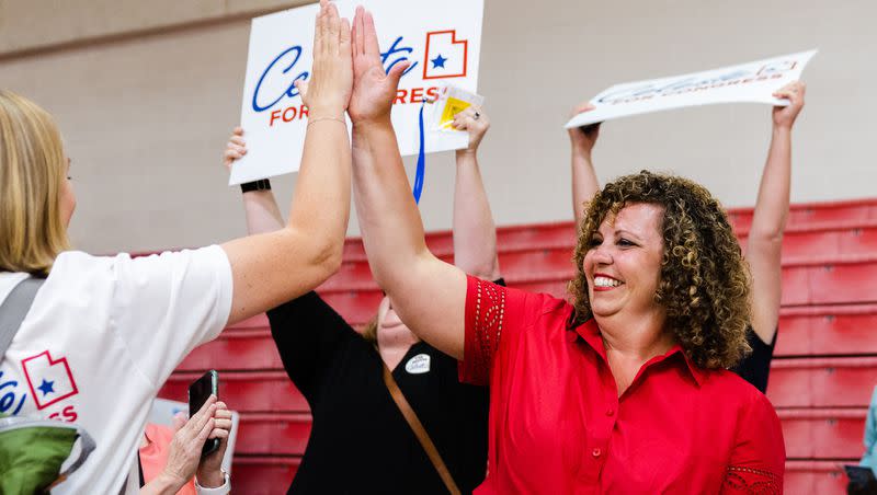 Utah Congressional 2nd District candidate Celeste Maloy high-fives a supporter after securing the nomination during the Utah Republican Party’s special election at Delta High School in Delta on June 24, 2023.
