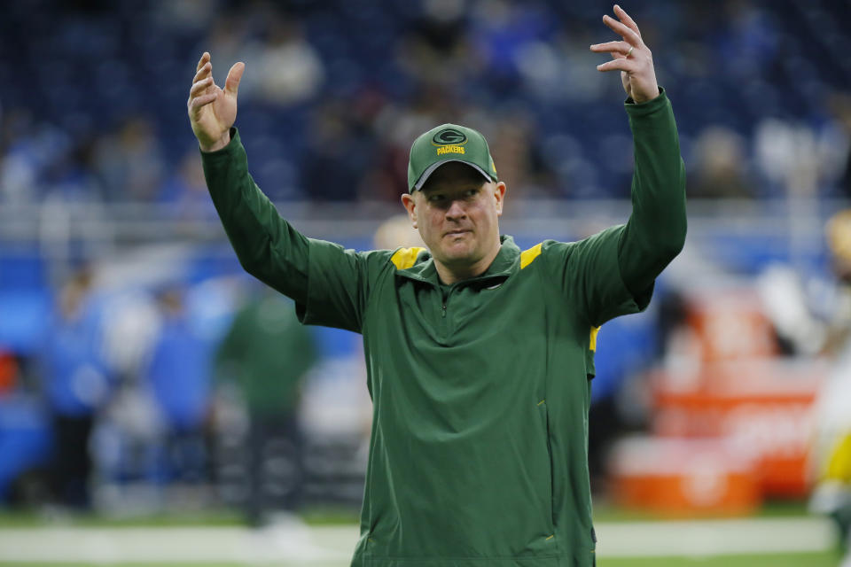 FILE - Green Bay Packers offensive coordinator Nathaniel Hackett gestures during pregame of an NFL football game against the Detroit Lions, Sunday, Jan. 9, 2022, in Detroit. A person with knowledge of the negotiations told The Associated Press early Thursday morning, Jan. 27, 2022, that the Denver Broncos are finalizing a deal to hire Packers offensive coordinator as their new head coach. The person spoke on condition of anonymity because the deal was still in the works and the team hadn't announced the hiring. (AP Photo/Duane Burleson, File)