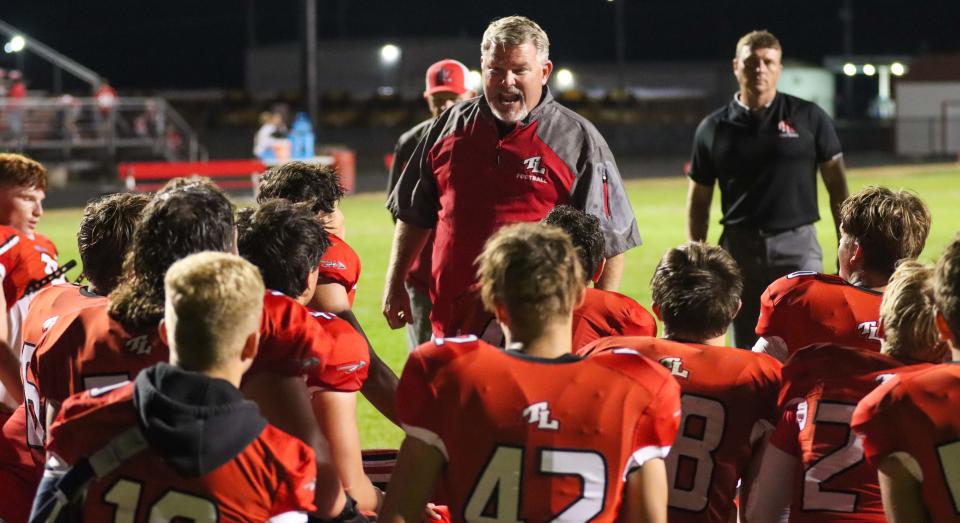 Kevin O'Shea speaks with his team following the IHSAA football game against the Benton Central Bison, Friday, Sept. 15, 2023, at Twin Lakes High School in Monticello, Ind. Twin Lakes beat Benton Central, 41-14.