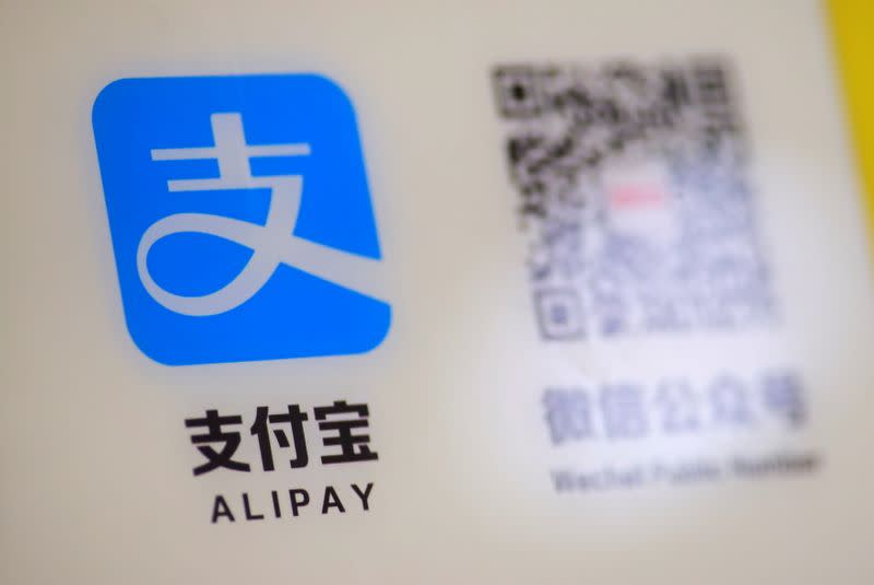 A logo of the electronic payment service Alipay that belongs to Ant Group Co Ltd is seen at a vending machine in Beijing