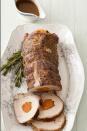 <p>Pigs' tendency to root forward signifies progress (unlike lobsters, which move backward) make pork loin the most lucky of main-dish choices for New Year's day. Seasonal apricots add a touch of sweet to the dish. </p><p><strong><a href="https://www.countryliving.com/food-drinks/recipes/a4059/apricot-stuffed-pork-loin-recipe-clx1211/" rel="nofollow noopener" target="_blank" data-ylk="slk:Get the recipe;elm:context_link;itc:0;sec:content-canvas" class="link ">Get the recipe</a>.</strong> </p>