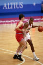 BARCELONA, SPAIN - AUGUST 8: Earvin Magic Johnson #15 of the United States moves the ball in the 1992 Olympic game against Croatia on August 8, 1992 in Barcelona, Spain. The "Dream Team" defeated Croatia 117-85.