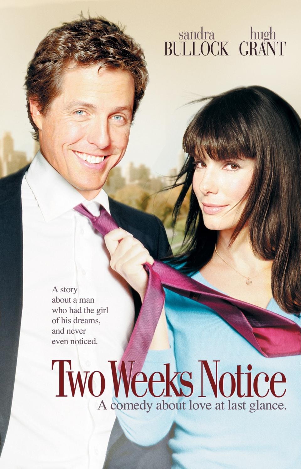 Sandra Bullock playfully holds Hugh Grant's tie on a movie poster for "Two Weeks Notice," a romantic comedy