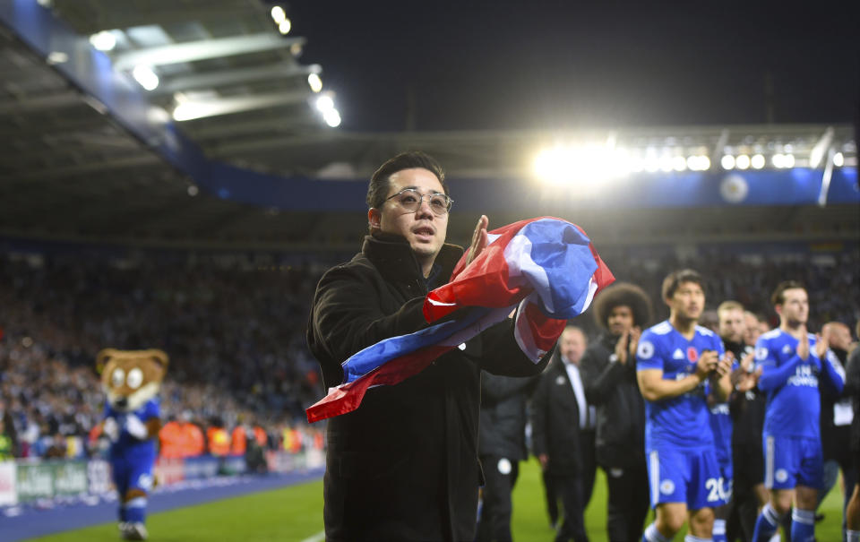 Aiyawatt Srivaddhanaprabha, son of Leicester City chairman, Vichai Srivaddhanaprabha applauds the fans after the final whistle of the English Premier League soccer match between Leicester City and Burnley at the King Power Stadium, Leicester, England, Saturday, Nov. 10, 2018. (Joe Giddens/PA via AP)