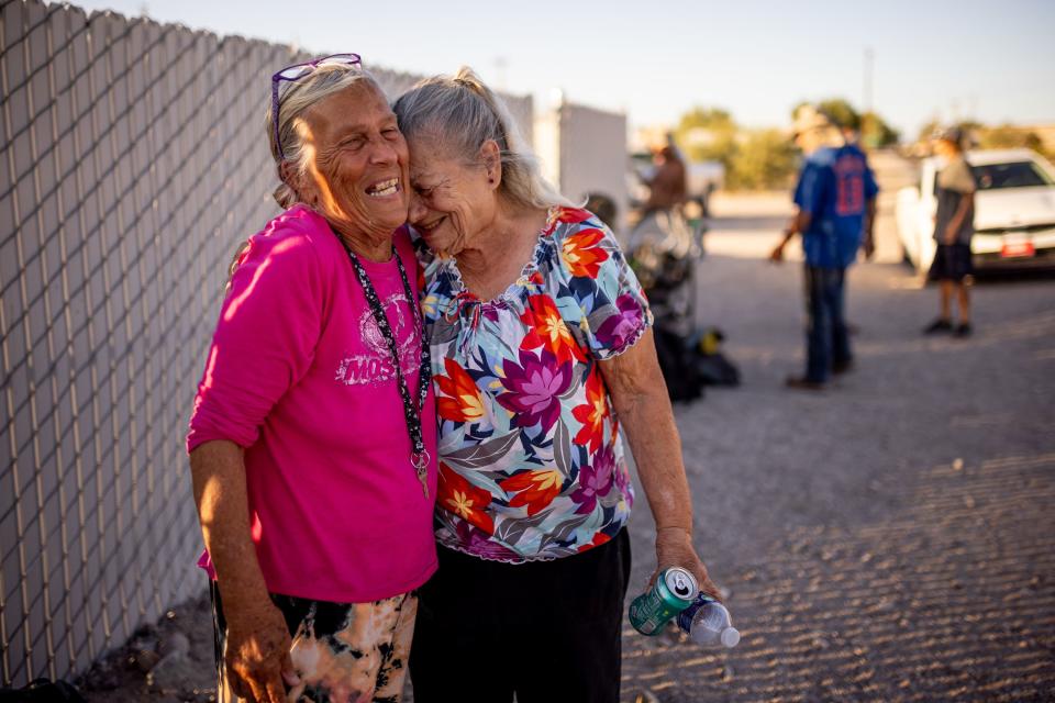 Shirley Rogers and Norma Thornton embrace after distributing a free meal to homeless people in Bullhead City, Ariz., on Tuesday, Oct. 24, 2023. Rogers is a routine visitor for Thornton’s meals and often helps distribute the food, but will soon be moving to Georgia where she has family. | Spenser Heaps, Deseret News