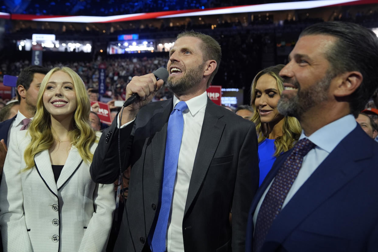 Eric Trump, center, with, from left, Tiffany Trump, Lara Trump and Donald Trump Jr., at the first day of the Republican National Convention.