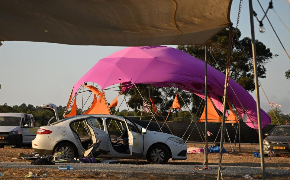 A car at the Supernova Music Festival is left abandoned following the attack