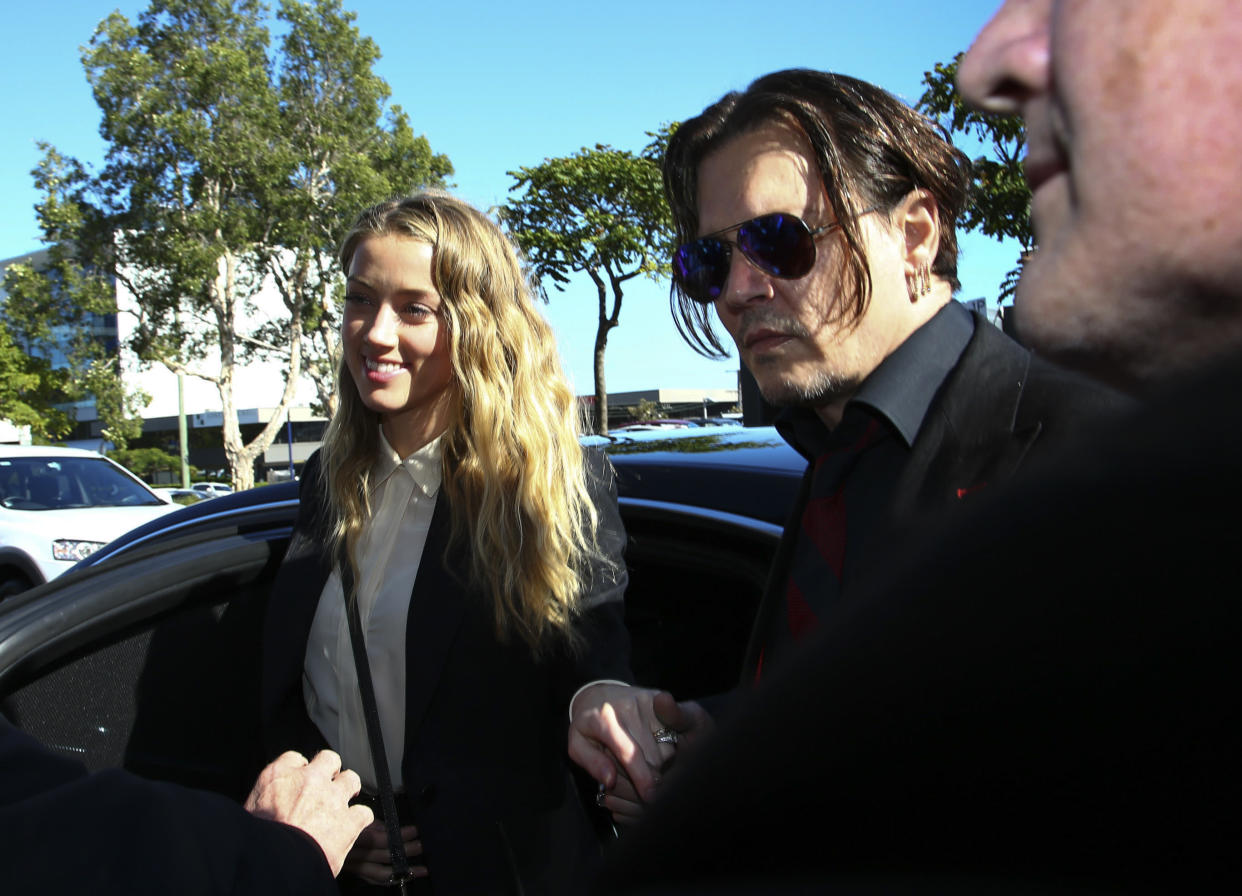 Johnny Depp y Amber Heard en la corte en Australia en el 2016. (Photo credit should read PATRICK HAMILTON/AFP via Getty Images)