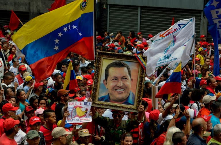 Supporters of Venezuelan President Nicolas Maduro take part in a rally against the secretary general of the Organization of American States (OAS), Luis Almagro, in Caracas, on March 28, 2017