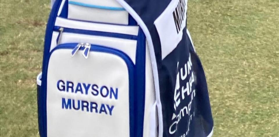 Jay Green, who was the caddie for the late Grayson Murray on the PGA Tour this season, handles Murray’s golf bag before a remembrance for Murray June 2, 2024 at Raleigh Country Club. Chip Alexander