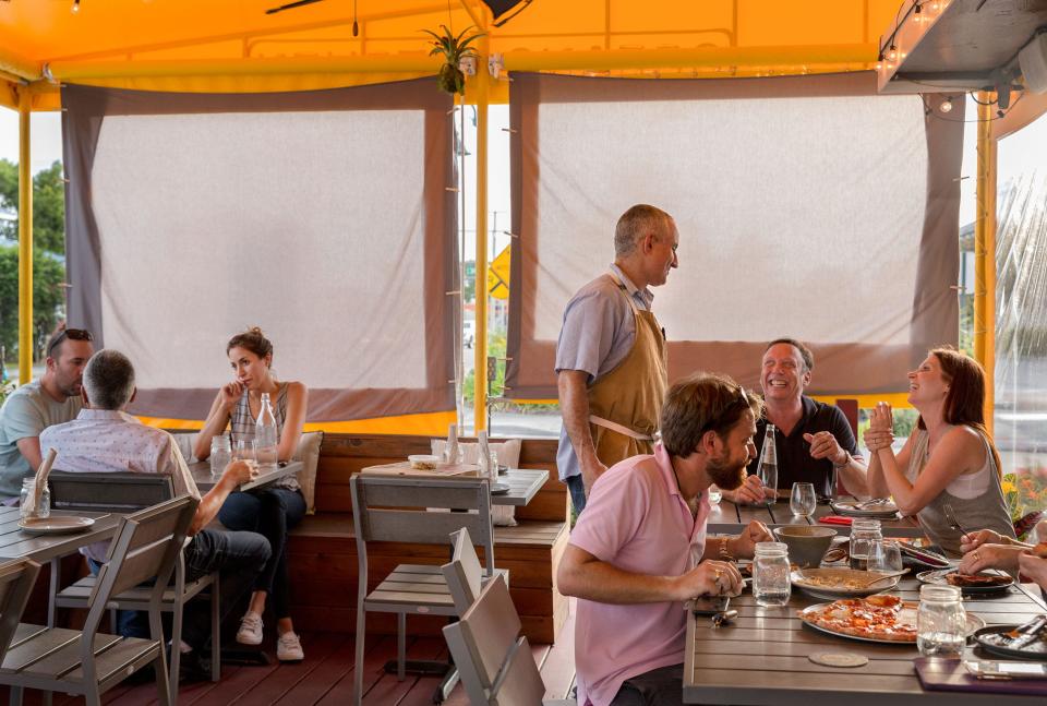 Chef/owner Jeremy Bearman chats with diners at his Oceano Kitchen in Lantana.  