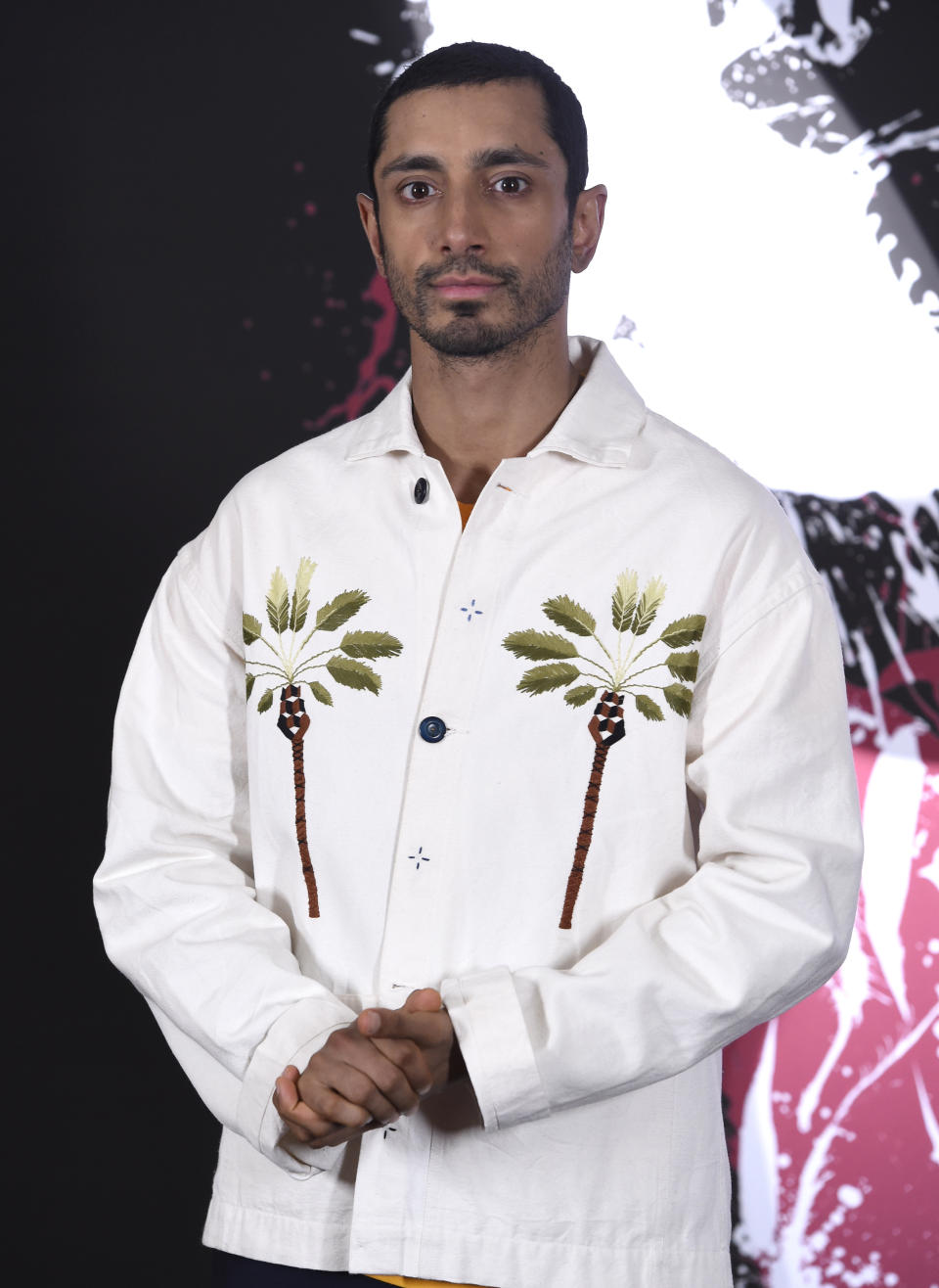 Riz Ahmed attends a photo call for "Venom" on Thursday, Sept. 27, 2018, at the Four Seasons Hotel in Los Angeles. (Photo by Chris Pizzello/Invision/AP)