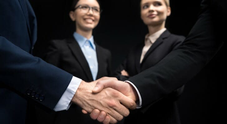 Two people shaking hands