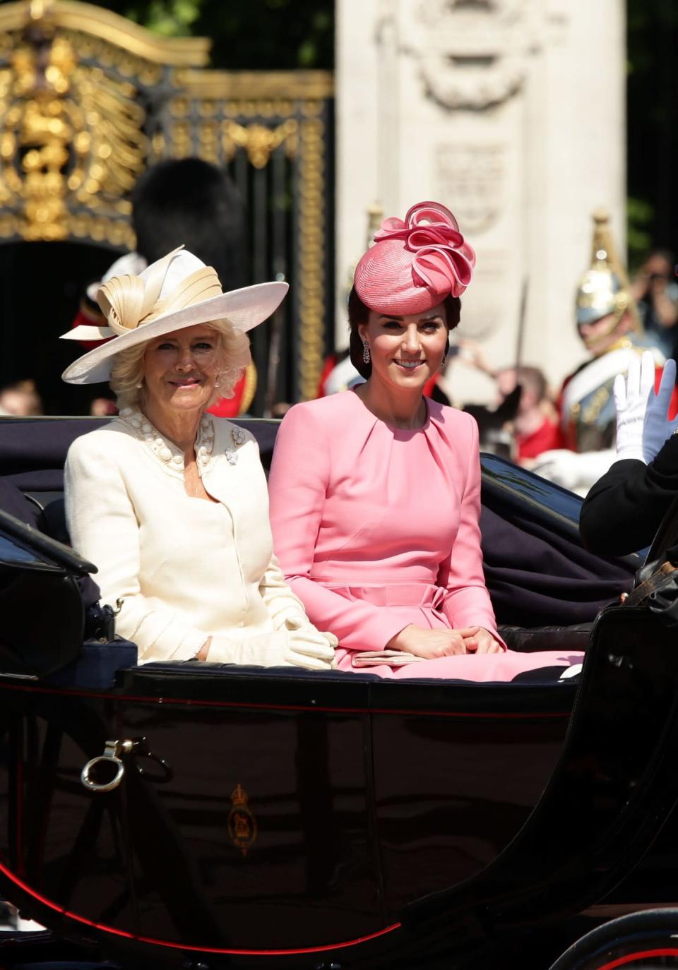 <p>Celebrating the Queen’s 91st birthday, Kate chose a summery pink dress by Alexander McQueen for the 2017 Trooping the Colour. The long-sleeved design had been customised from a sleeveless version and featured ruched detailing at the waist. Requiring a matching hat for any formal occasion, she chose a sculptural style by Jane Taylor.<br><i>[Photo: PA]</i> </p>